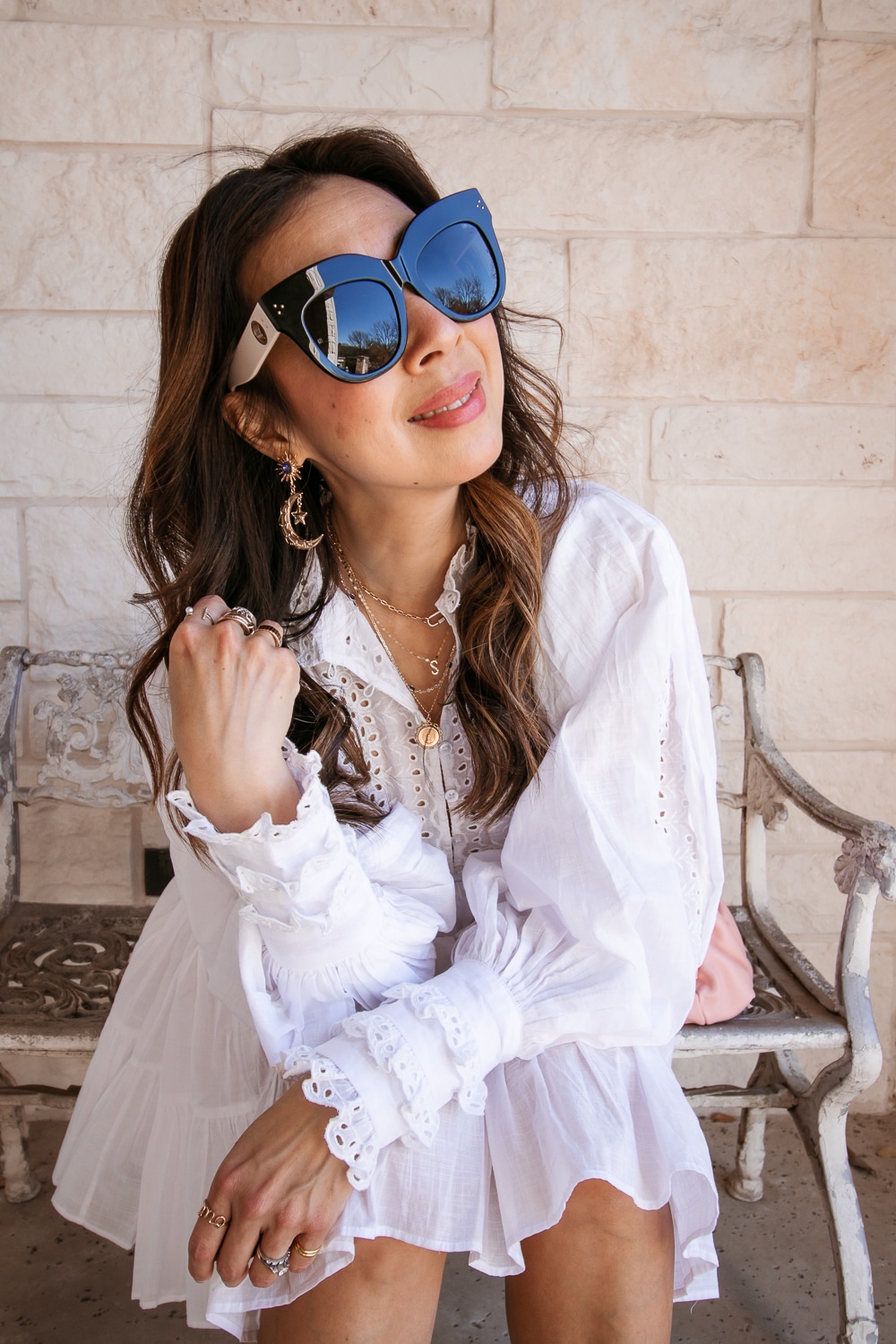 Style blogger wearing a pretty white dress for spring