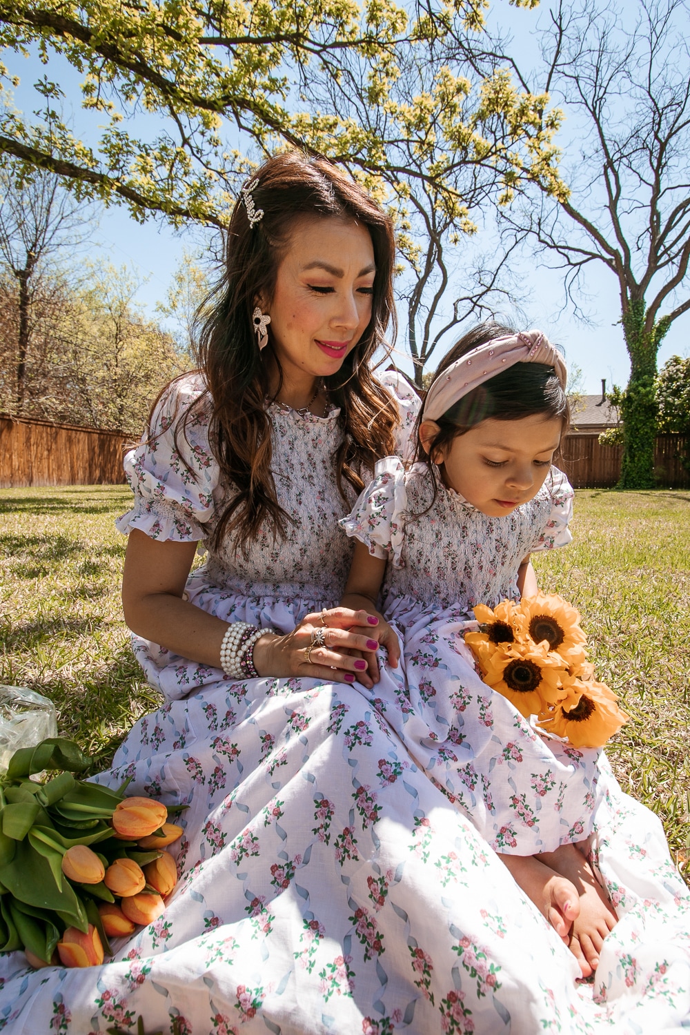style of sam and daughter in dondolo baby x loveshackfancy matching rose garden dresses, mommy and me outfit