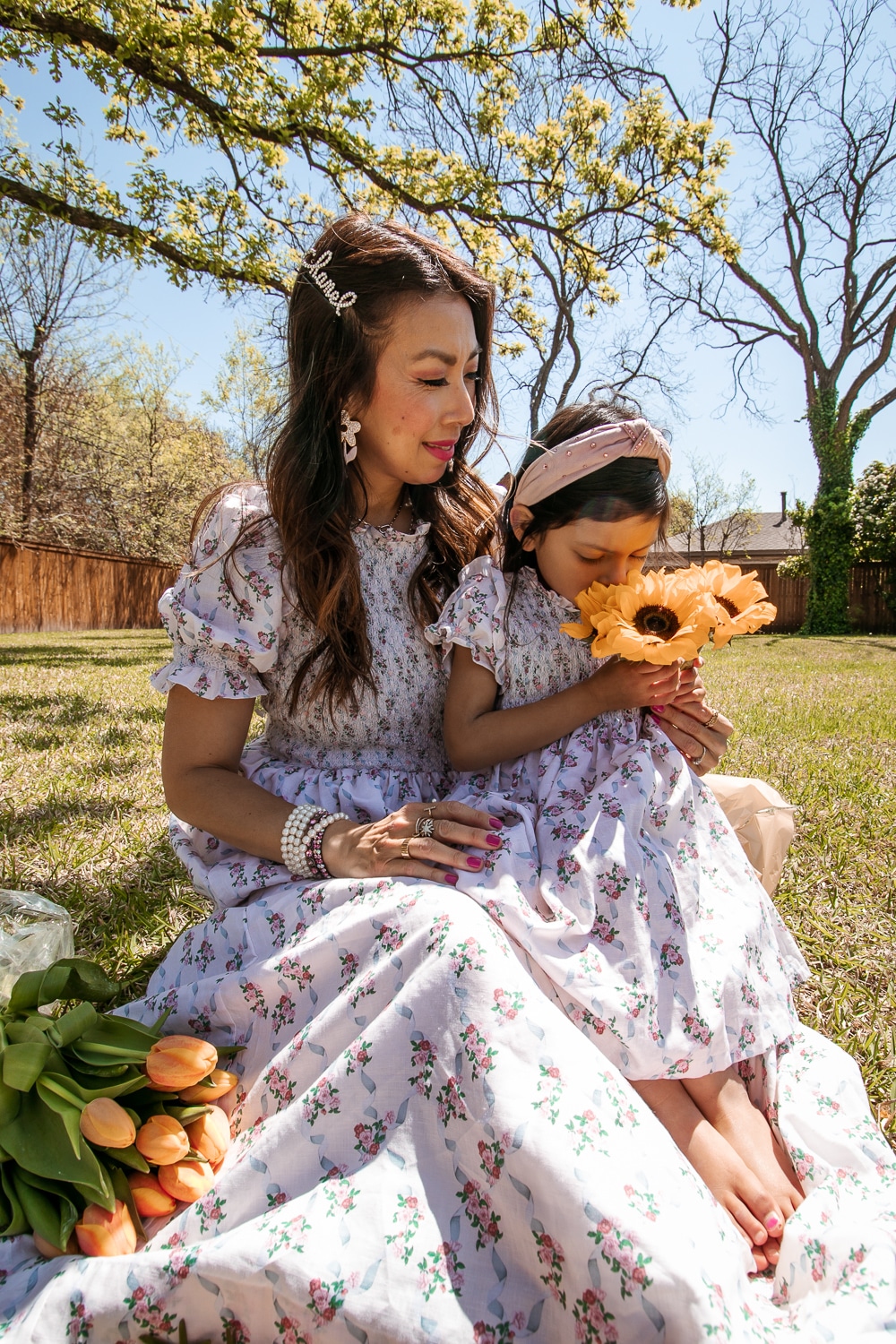 style of sam and daughter in dondolo baby x loveshackfancy matching rose garden dresses, mommy and me outfit