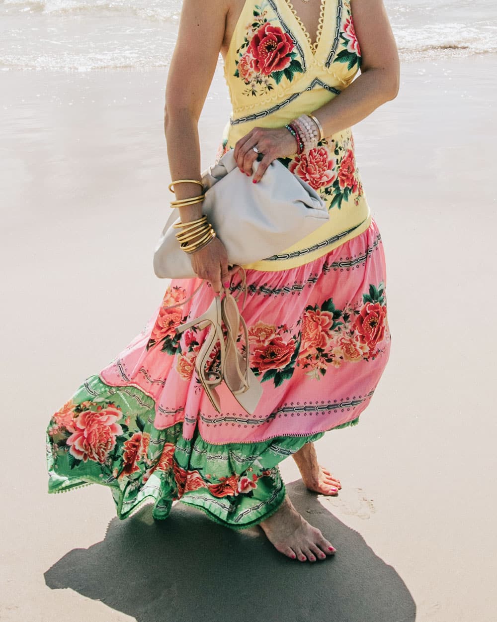 style of sam in farm rio manuela dress with bottega veneta pouch in plaster