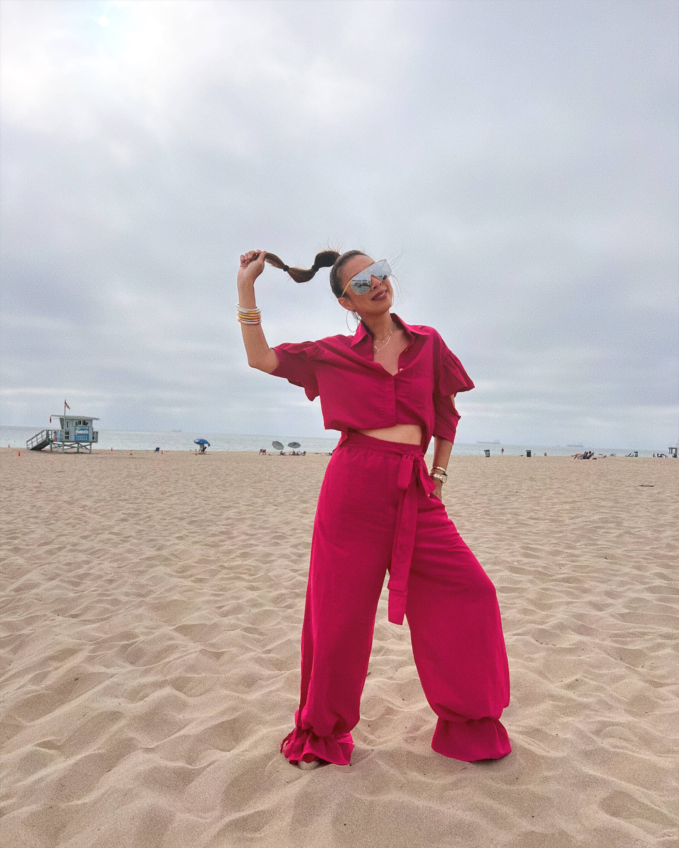 Style of Sam wearing HerStory top and pants on Manhattan Beach